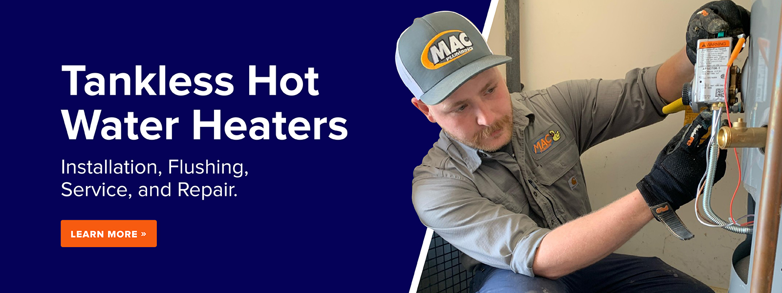 A Mac Plumbing Heating & Air employee repairs a hot water heater